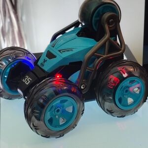 Tyco Turbo Blue LED Stunt RC Car – All-Terrain 360° Roller